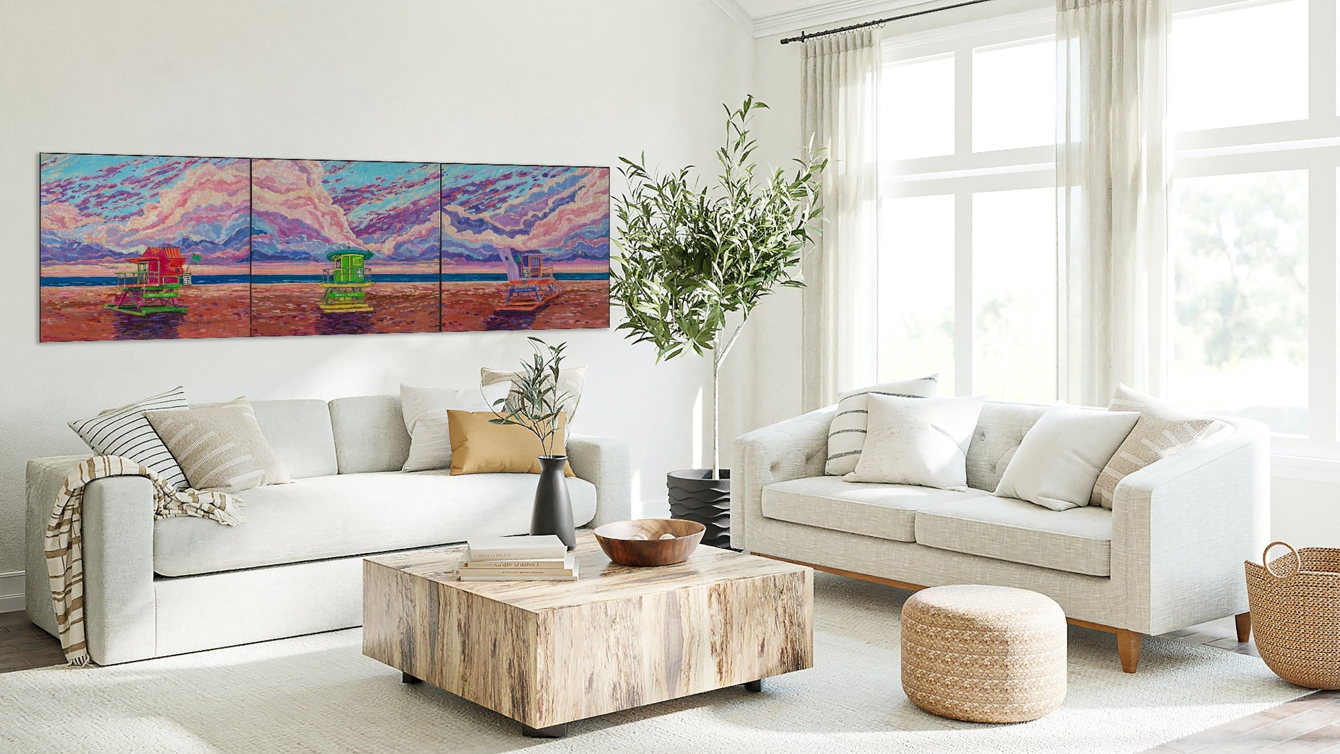 living room with 3 lifeguard beach sunrise paintings
