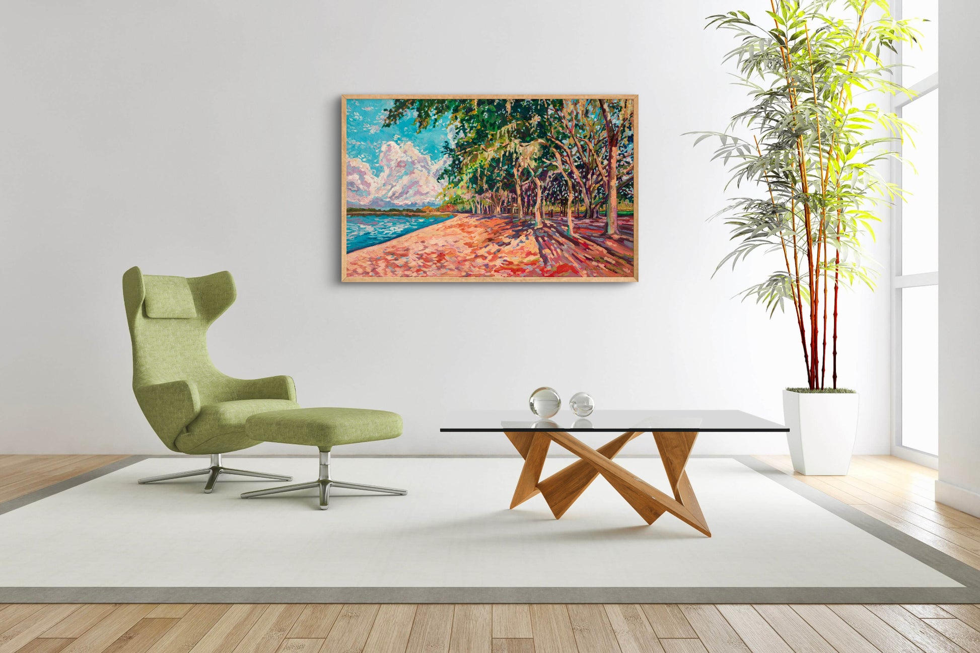 Very modern and sparce sitting room with green chair and footstool, glass top coffee table, bamboo plant and large colorful painting on wall.