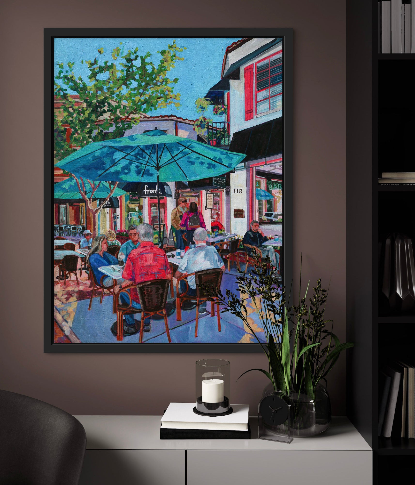 vibrant painting of people enjoying a coffee outside under a bright teal umbrella in a cozy warm office space.
