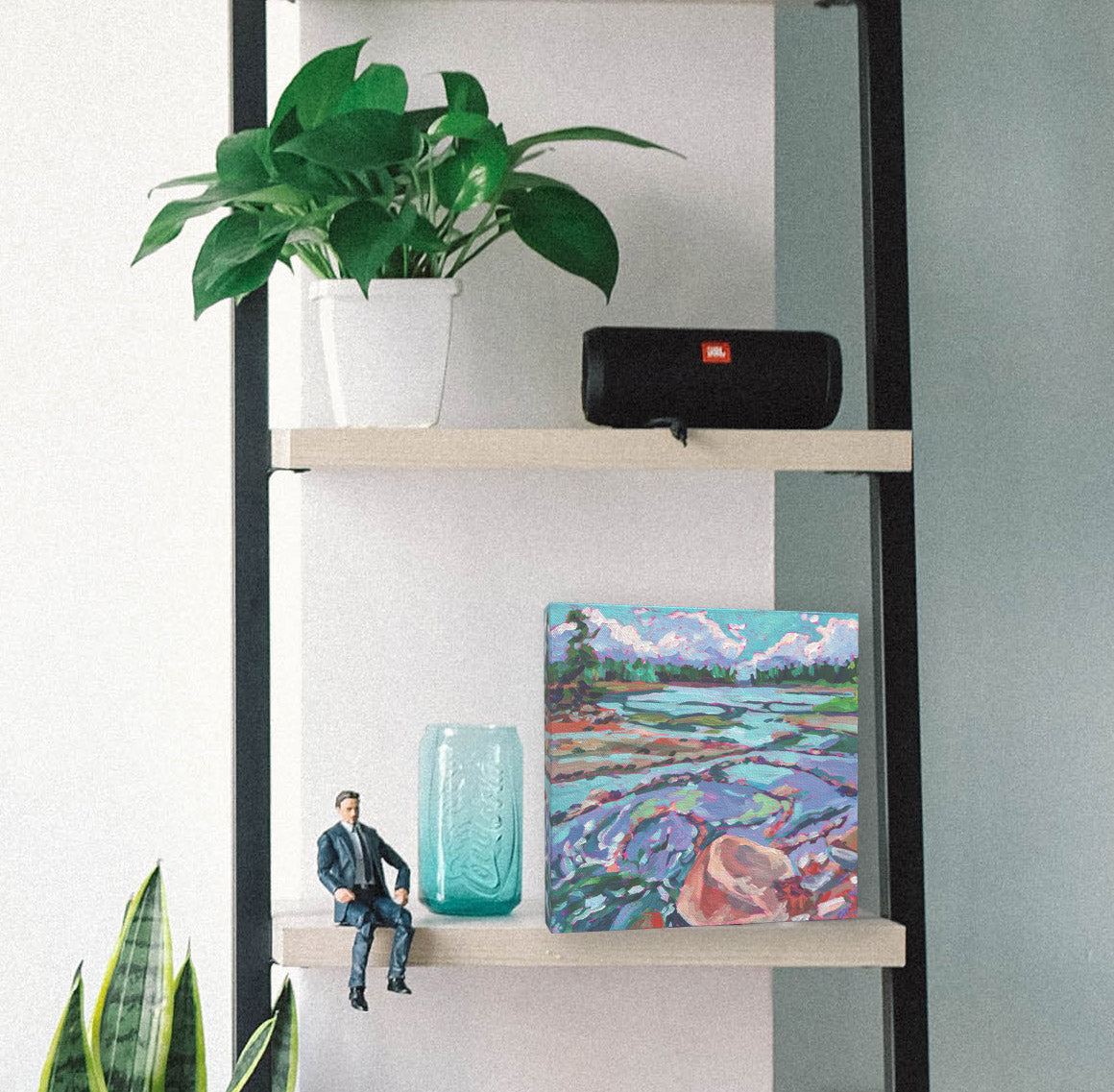 Mount Desert Island painting on bookshelf