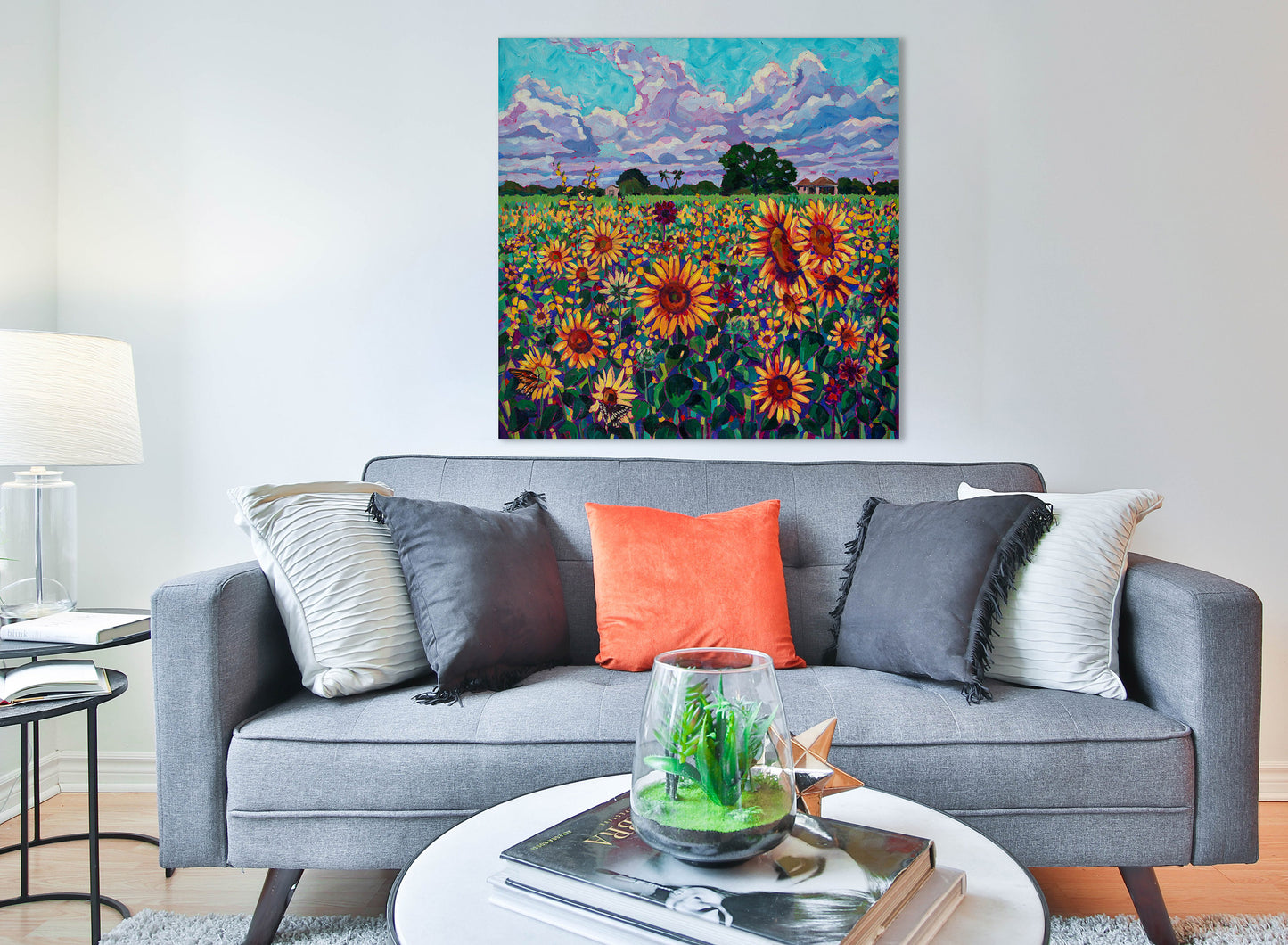 Original vibrant impressionistic painting of sunflowers in a field on living room wall