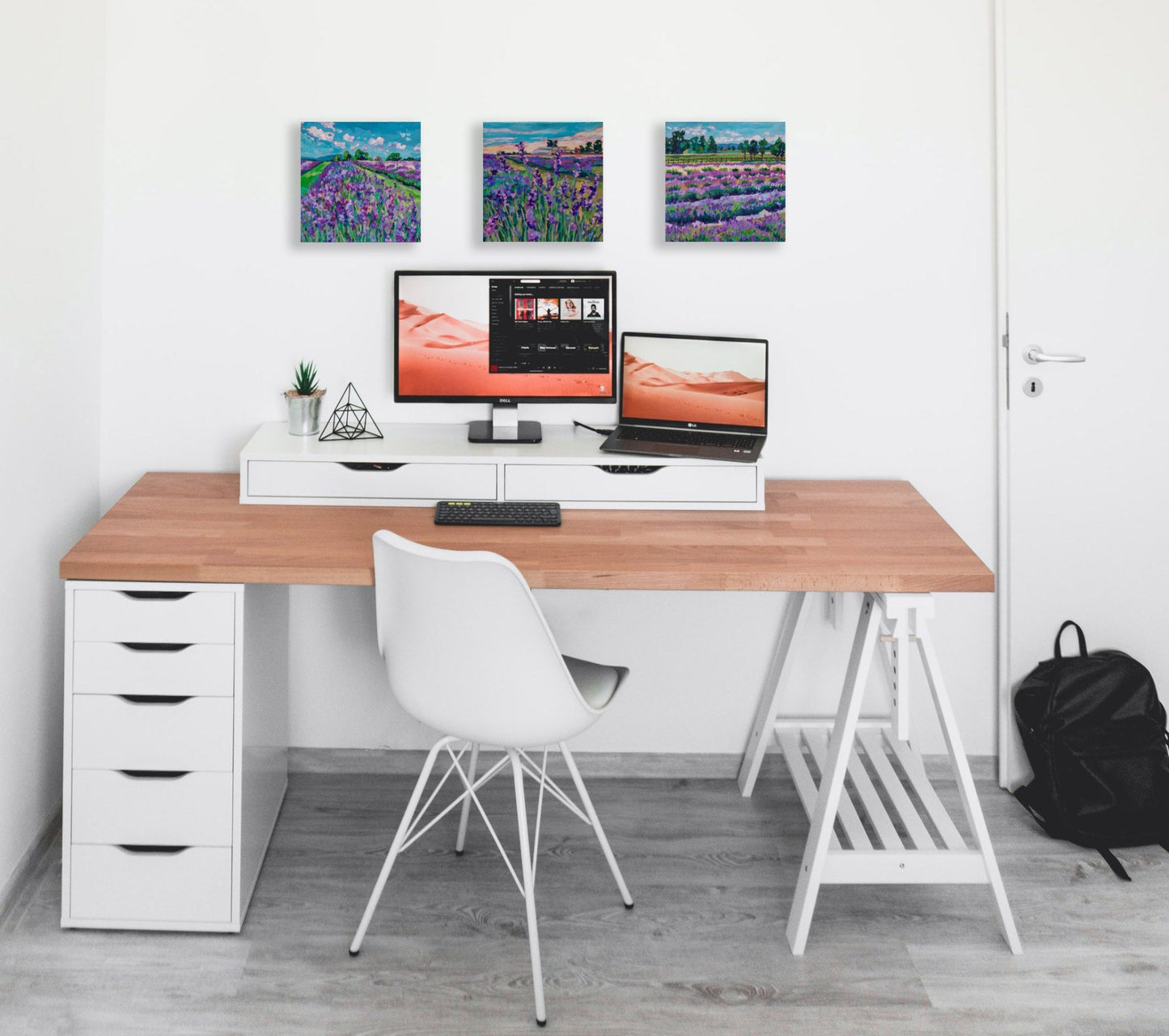 three lavender field paintings in home office