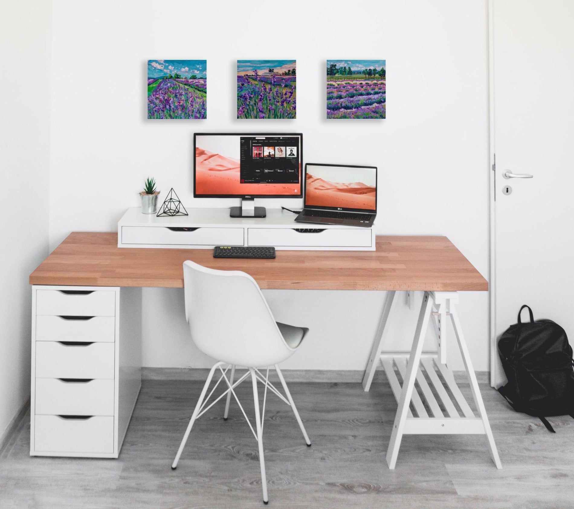 three lavender field paintings in home office