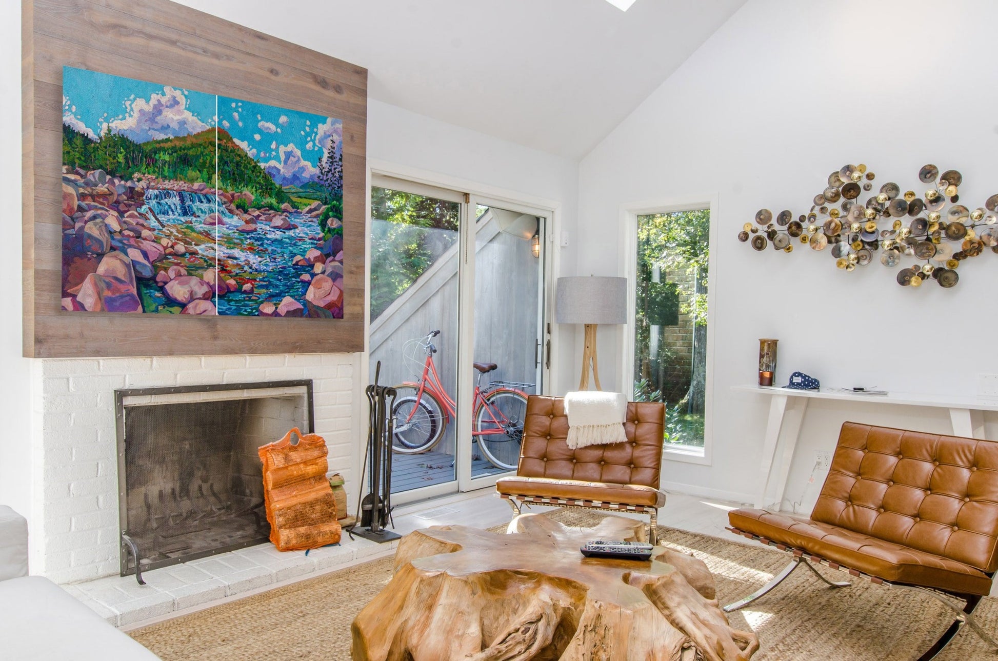 Mountain scene painting in trendy living room