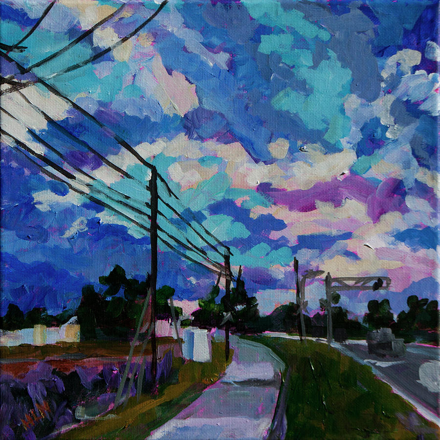 dramatic clouds with sidewalk and powerlines