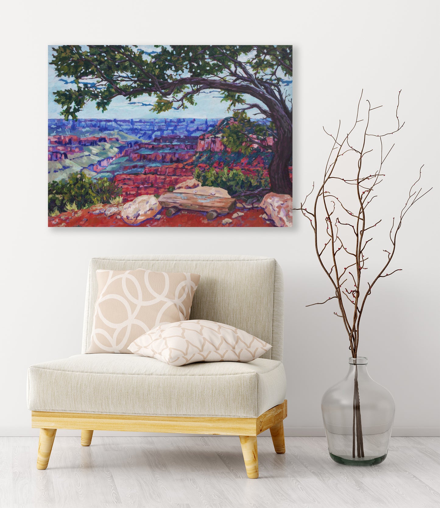 North Rim Grand Canyon painting on wall with chair and vase