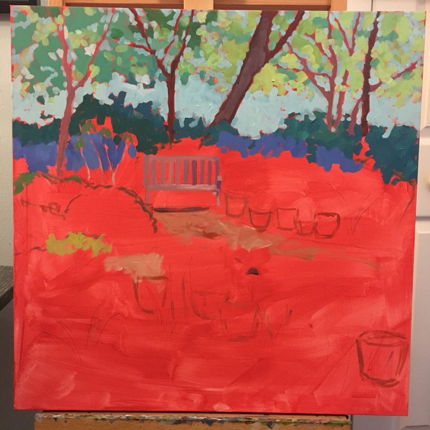 garden painting in progress with just background done on a cadmium red wash