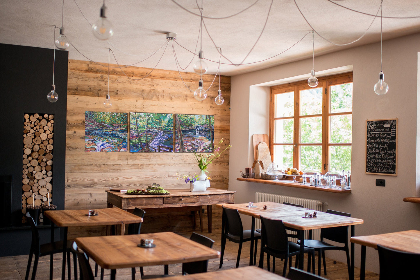 Three Cuyahoga green forest scenes in rustic restaurant