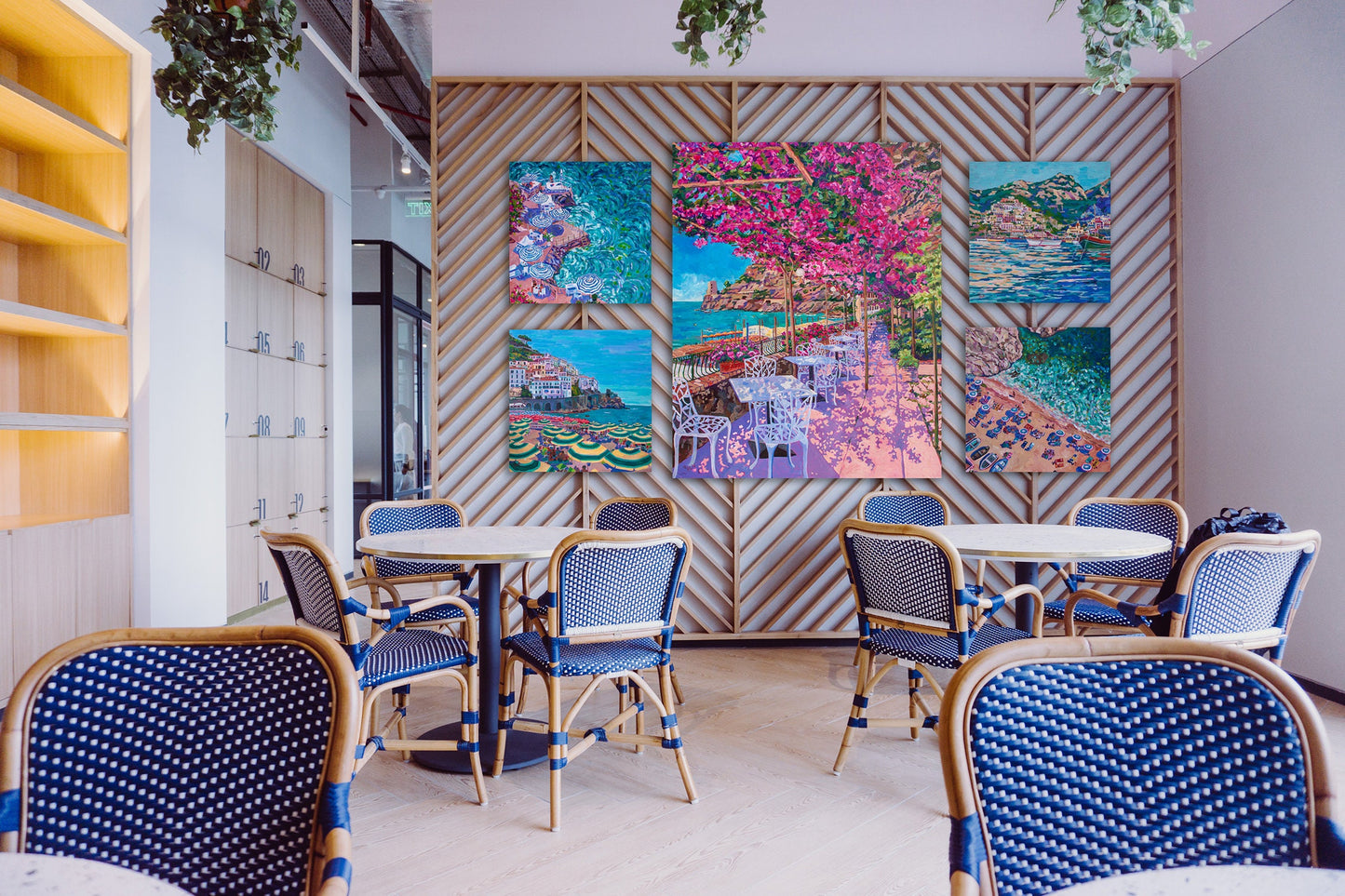 cafe with 5 vibrant expressive paintings of the Amalfi Coast of Italy