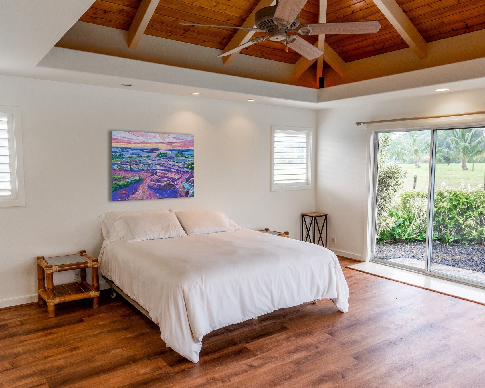 Bedroom setting with painting of Acadia National Park Cadillac Summit Sunrise
