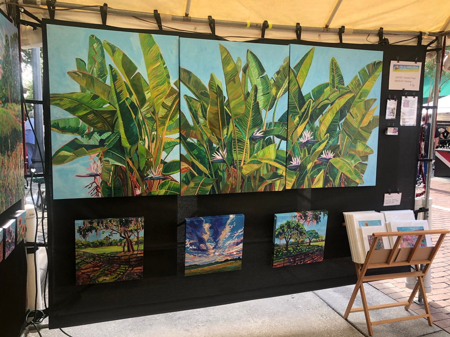three painting triptych bird of paradise at art festival in florida