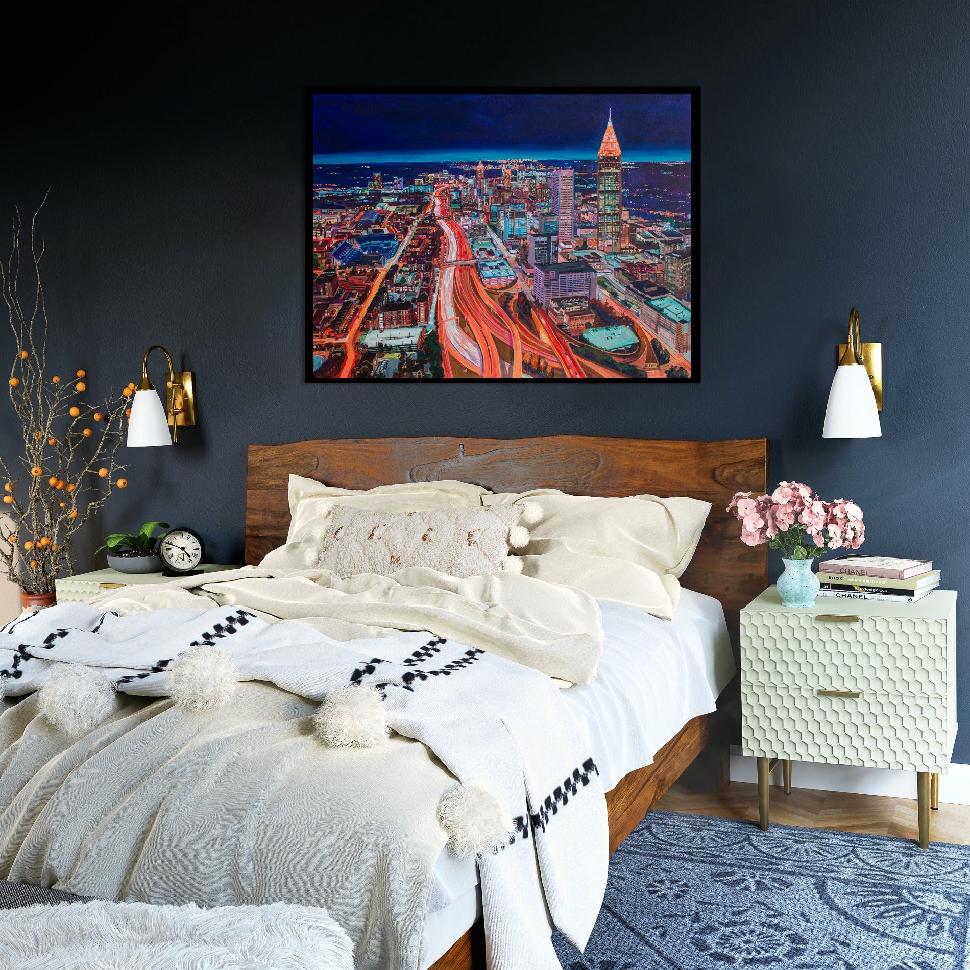 bedroom with night scene of Atlanta on wall