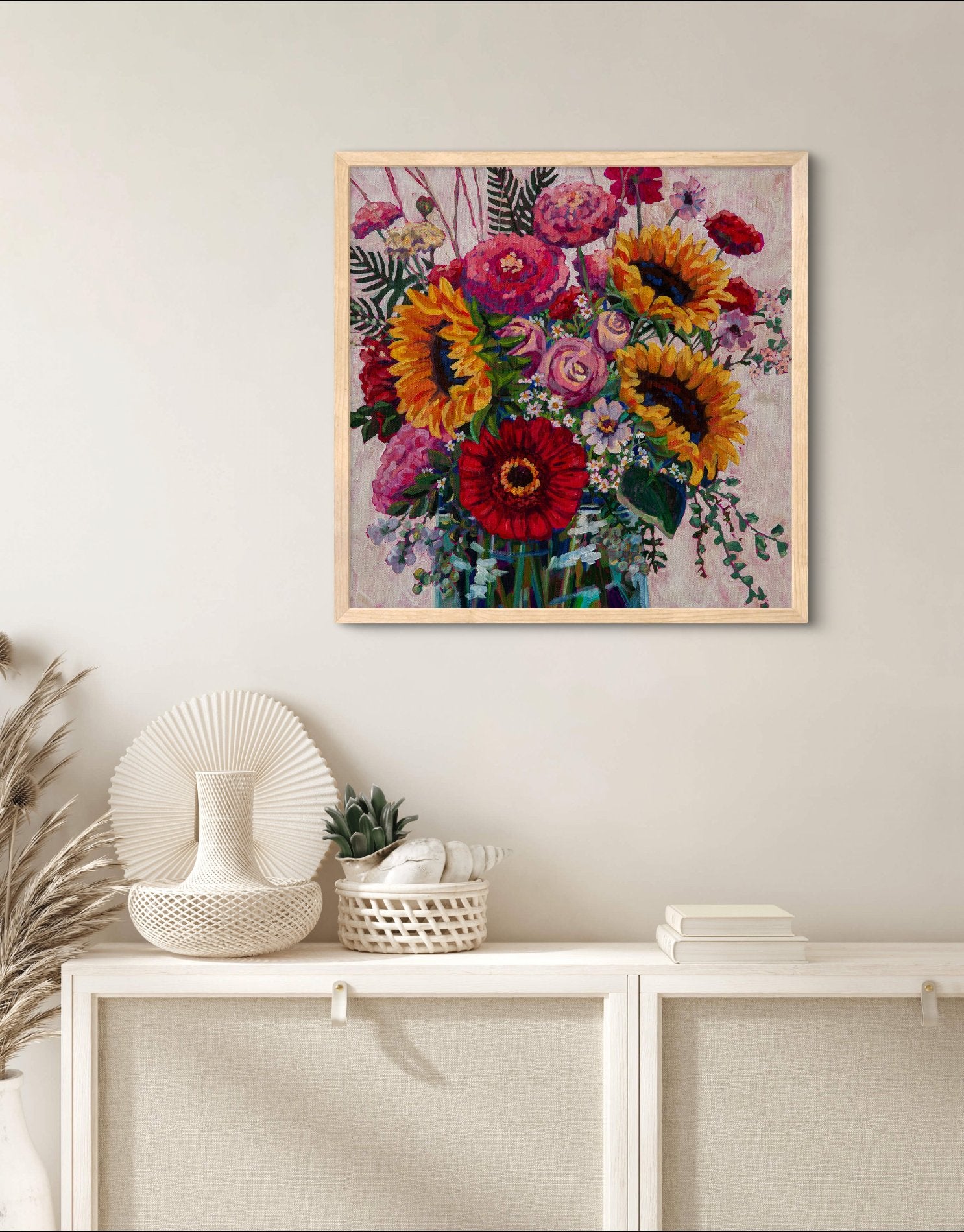 Quiet corner of neutral room with shelf and minimal decor, wall has bright modern impressionist painting of a cheerful floral arrangement.