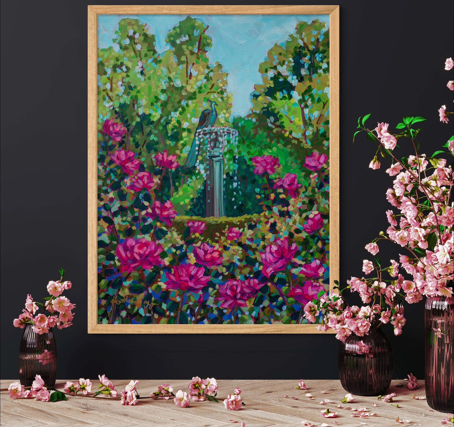 pink small roses in vases on shelf with vibrant impressionist painting on wall of dark wall.