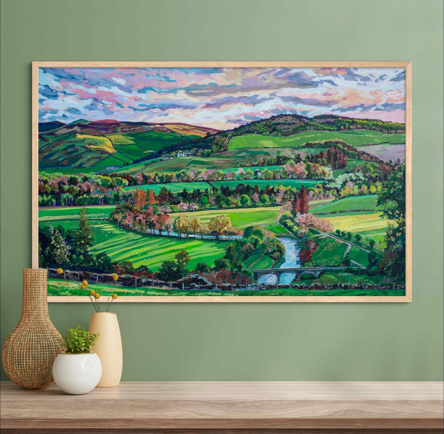 peaceful tranquil rural scene of countryside living in Pebbles, United Kingdom, Scotland on green wall above shelf with vases on it.