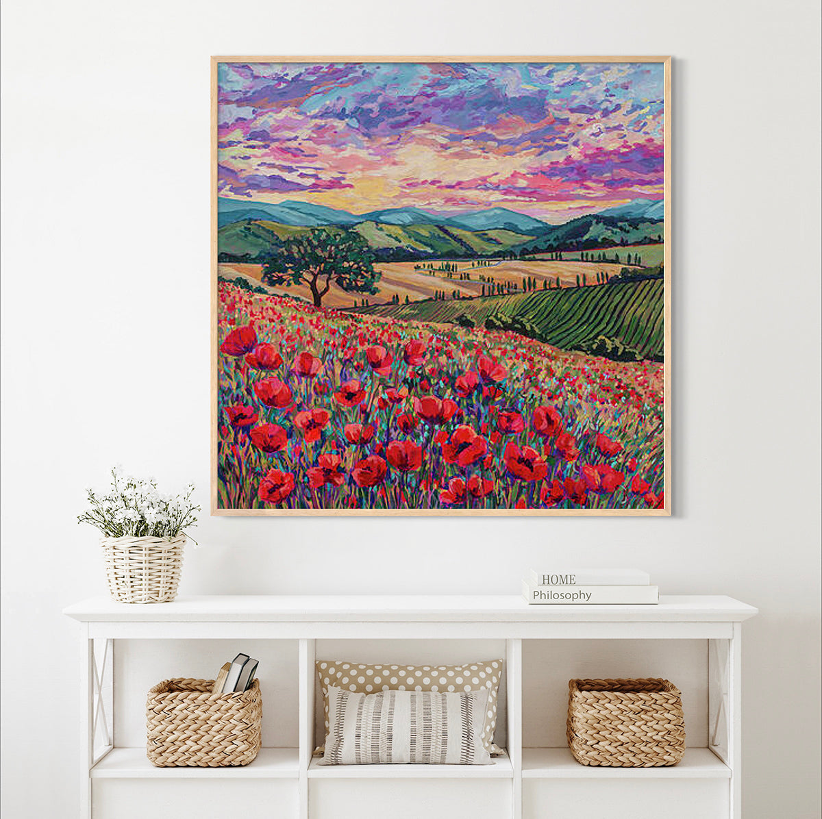 neutral room with vibrant sunset painting over rolling fields of poppies