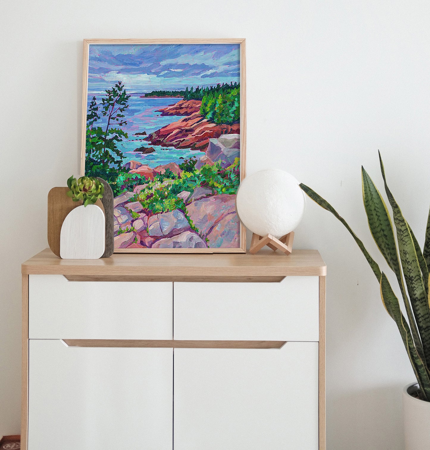 painting of Acadia's Coastline on dresser