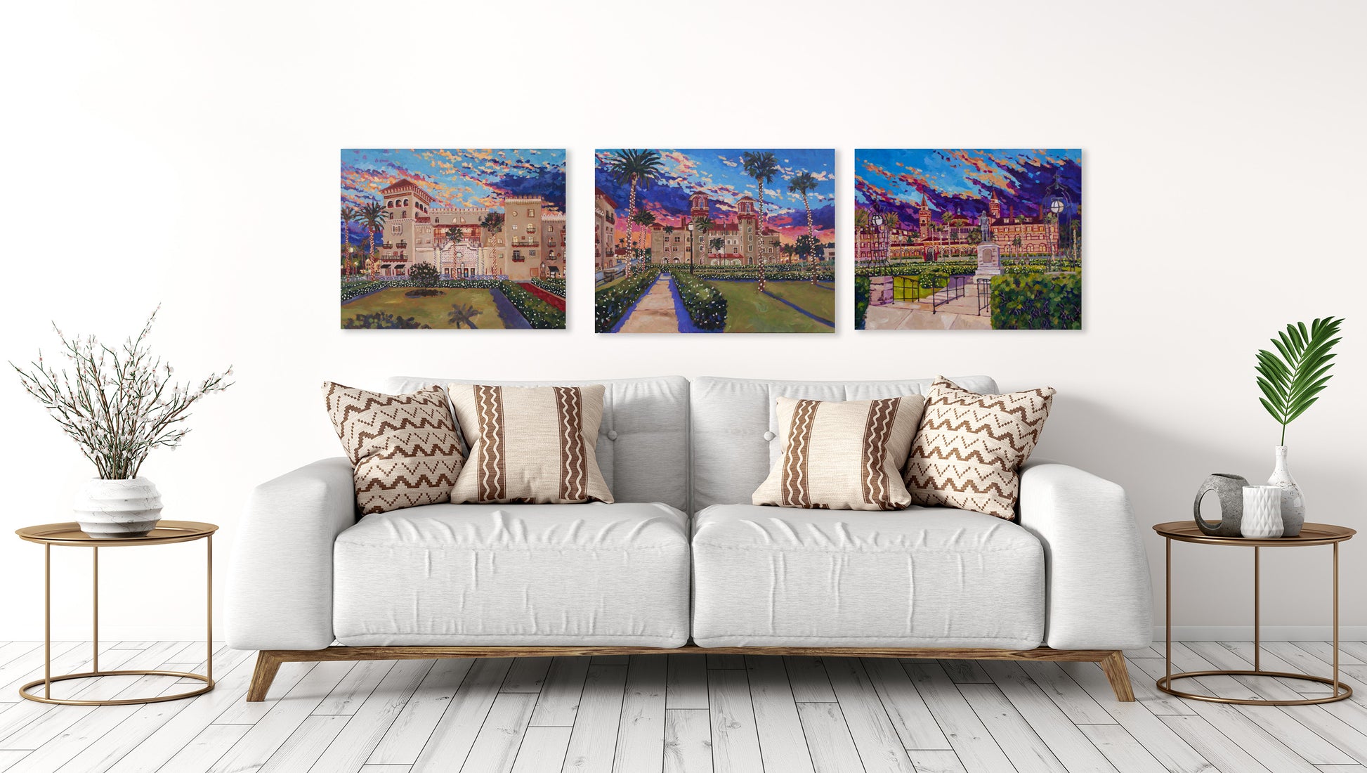 three paintings of historic buildings in st augustine in a living room setting