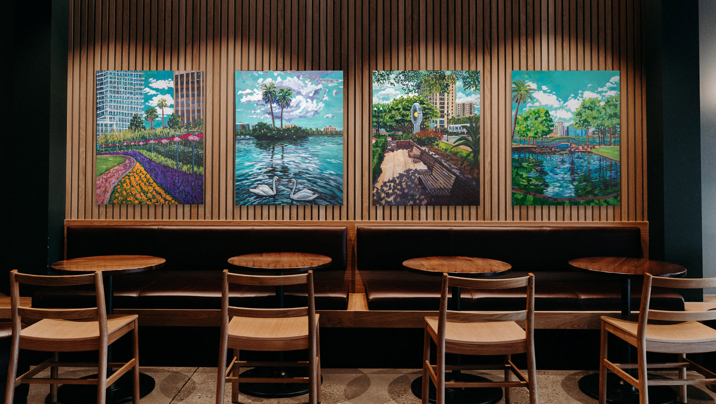 4 big downtown orlando paintings in restaurant setting
