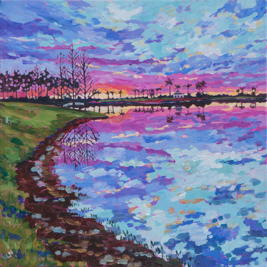 Rainbow colors painting of sunrise with dramatic sky and reflections in water