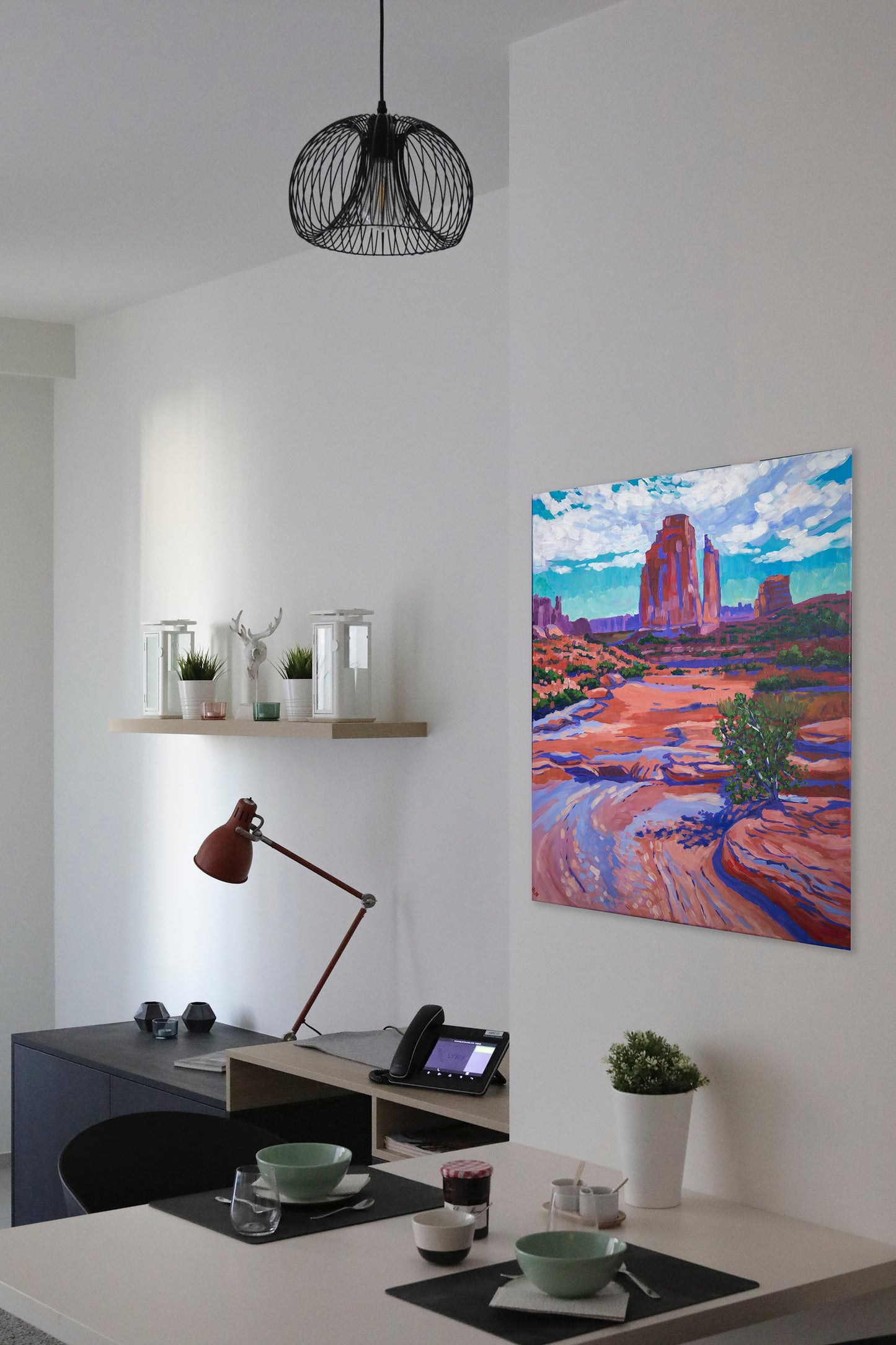 painting of arches national park in modern kitchen