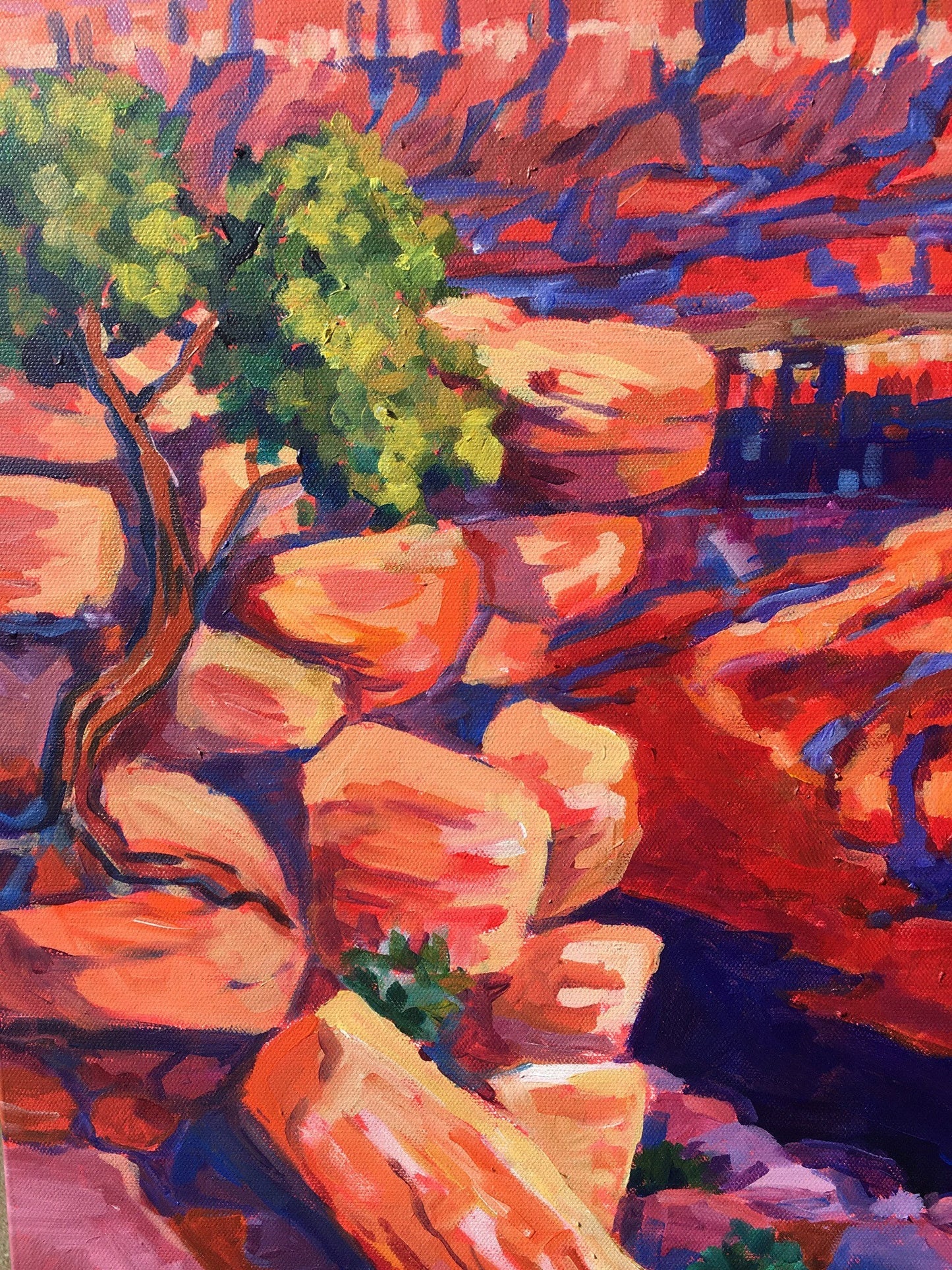 detail of the rocks and trees on painting