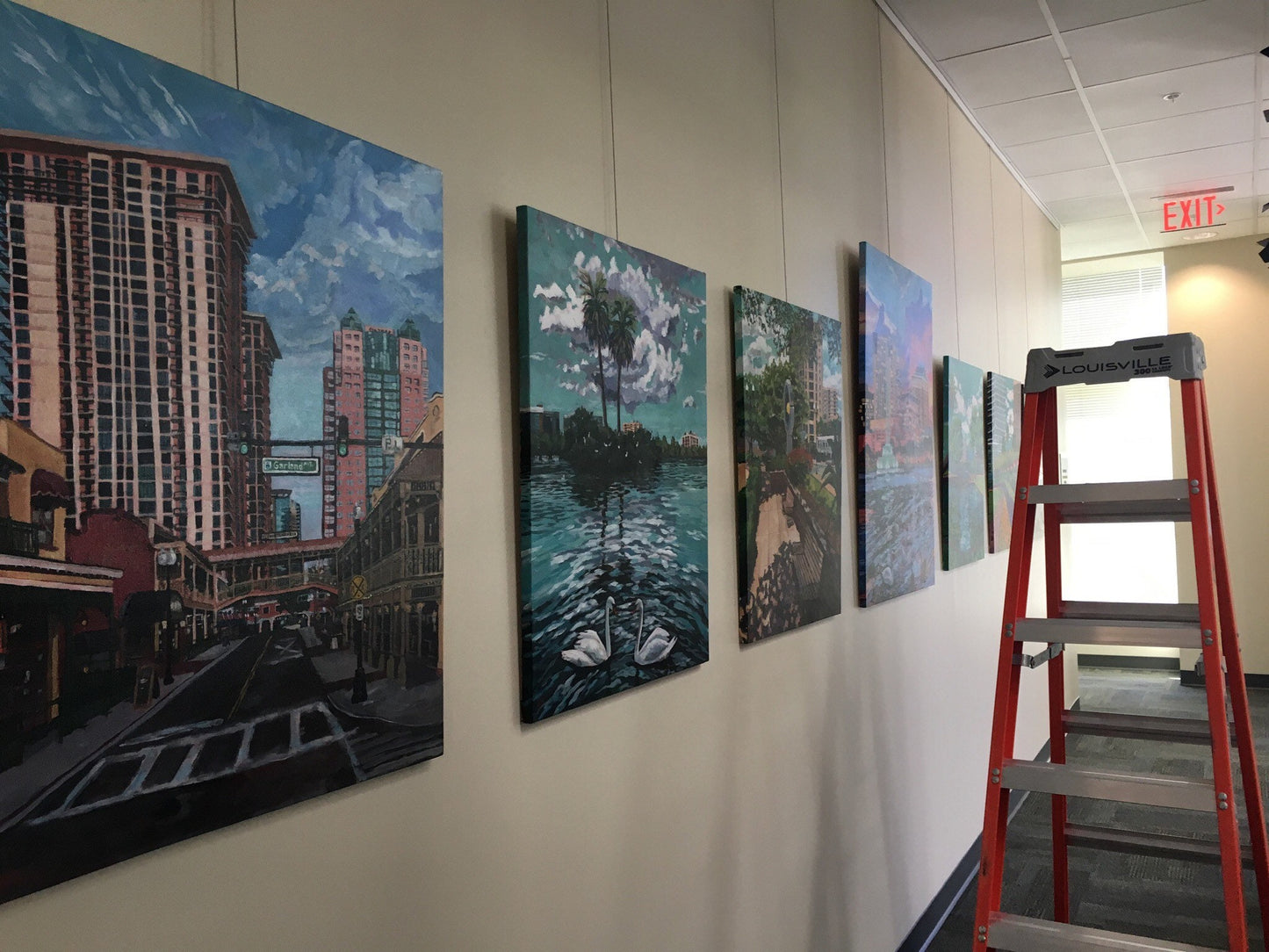 Series of downtown Orlando paintings in hung office space