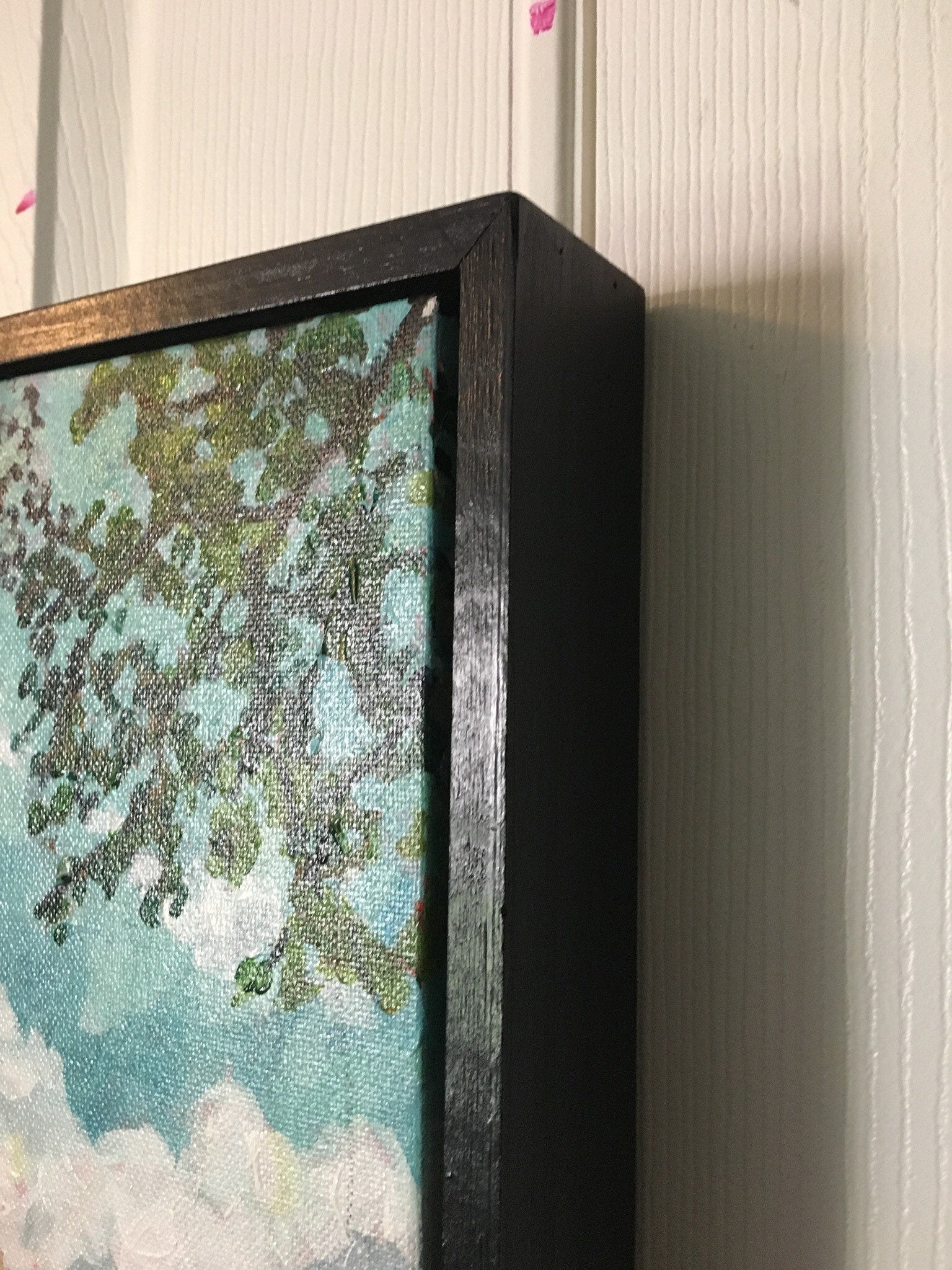 detail of painting with floating frame