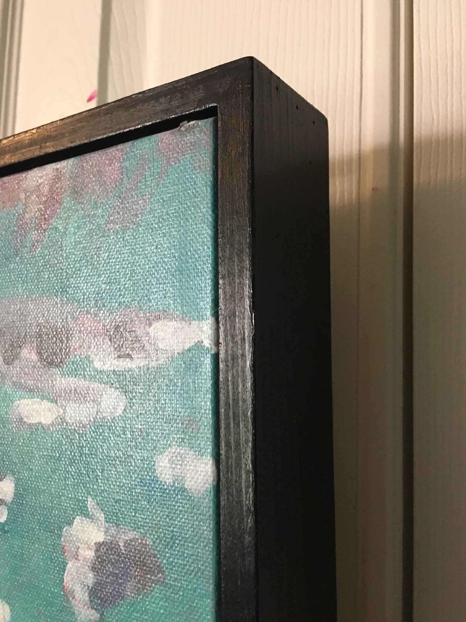 detail of canvas with floating frame