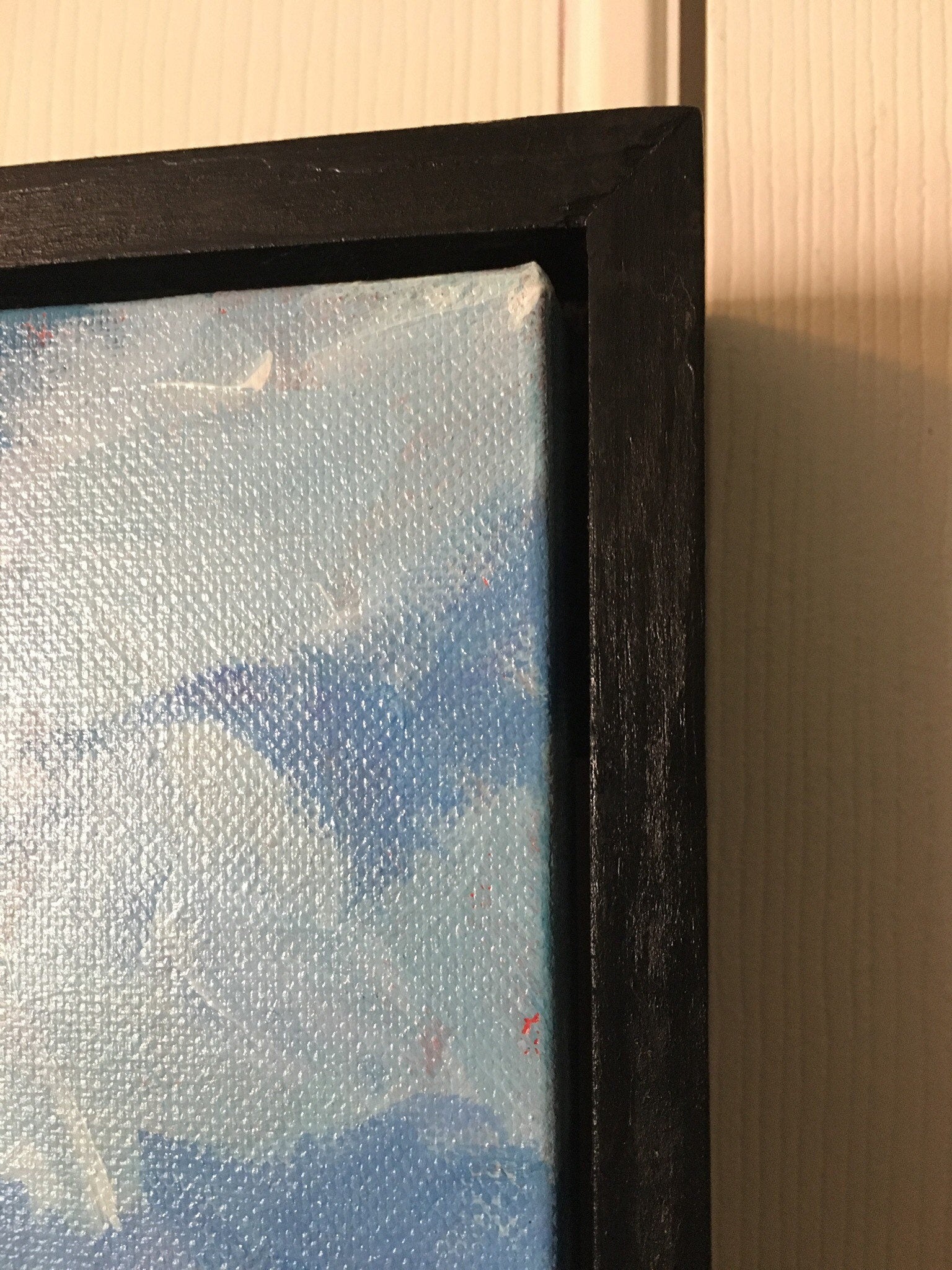 detail of canvas with floating frame