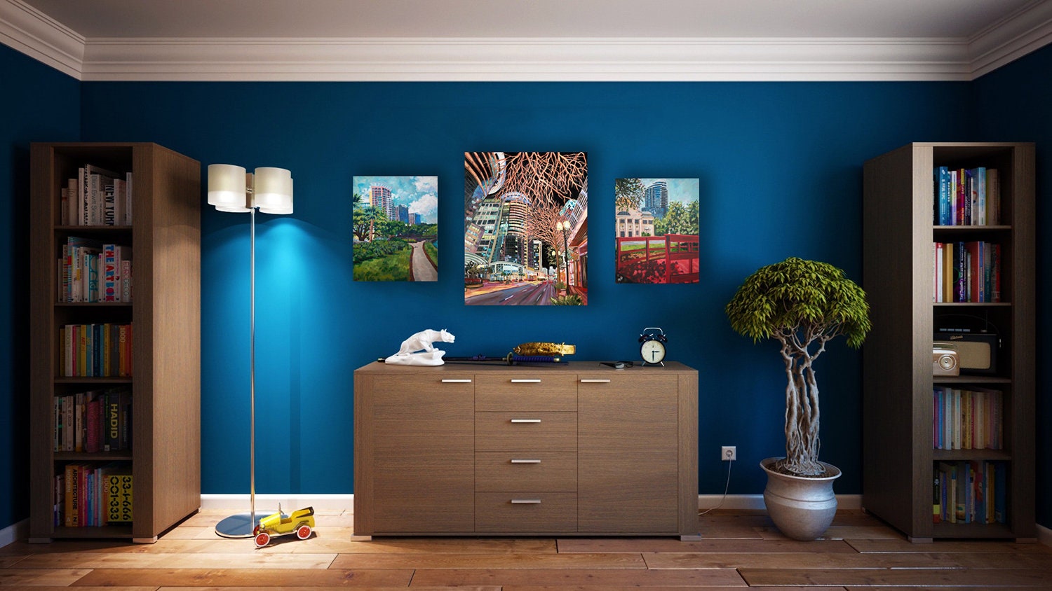 Three downtown Orlando paintings in bedroom with blue wall