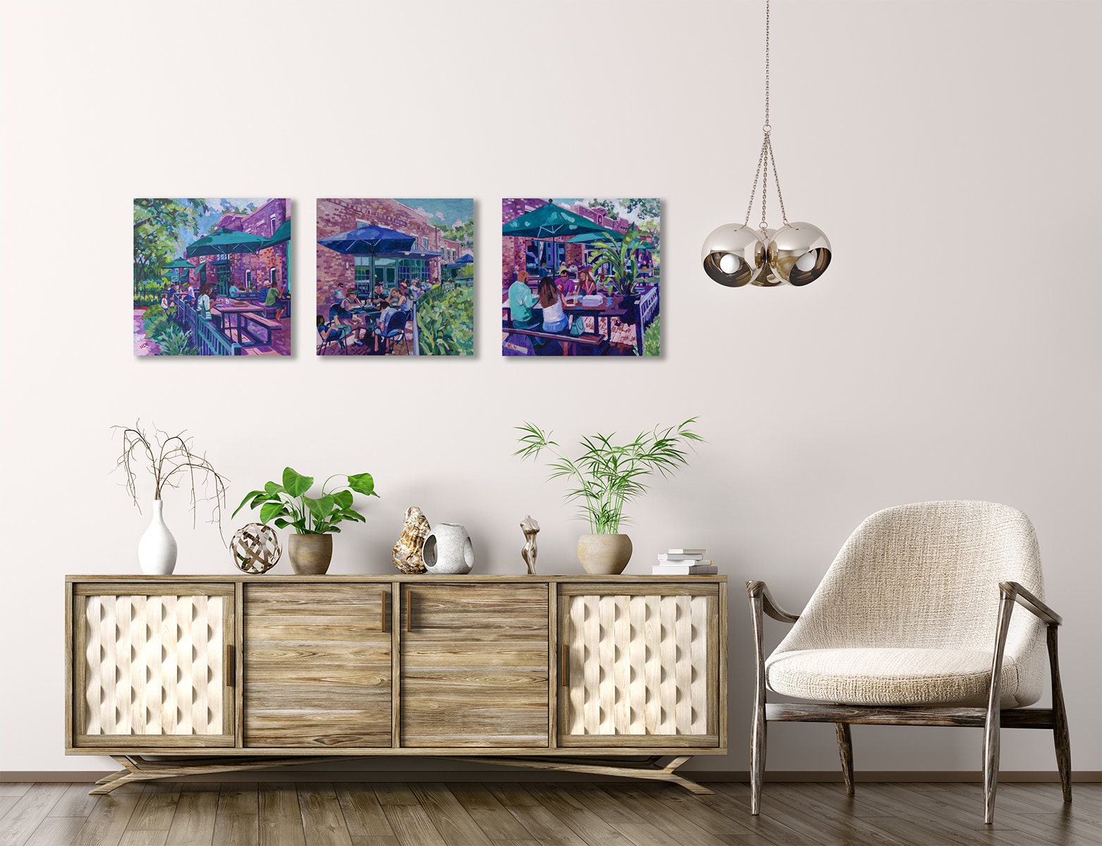three of the series of paintings of Winter Garden all part of the Plant Street Market building hanging on neutral decorated room
