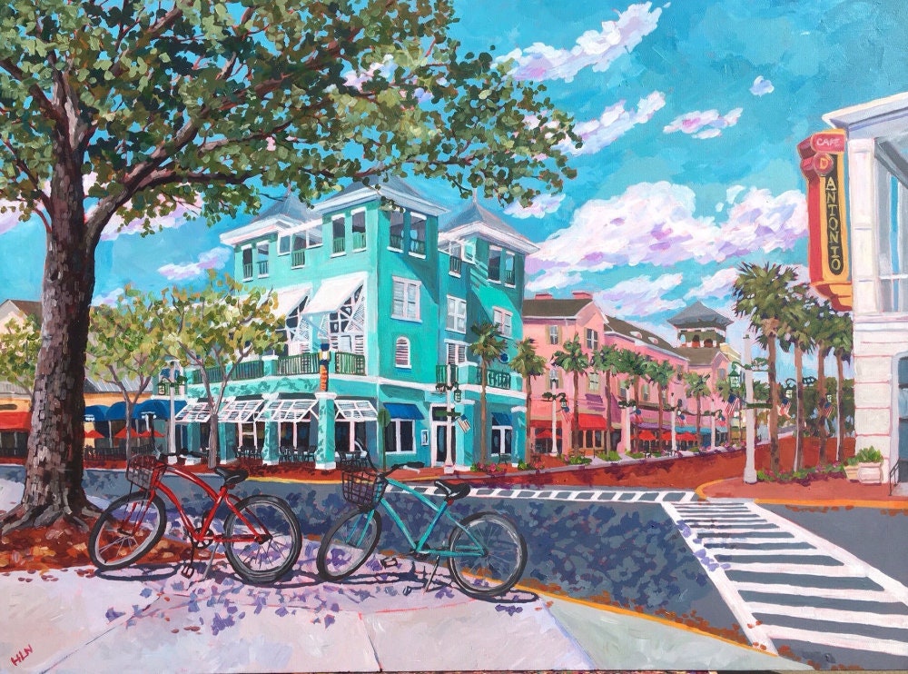 colorful buildings and bicycles add to the charm of the town center of Celebration Florida near Disney
