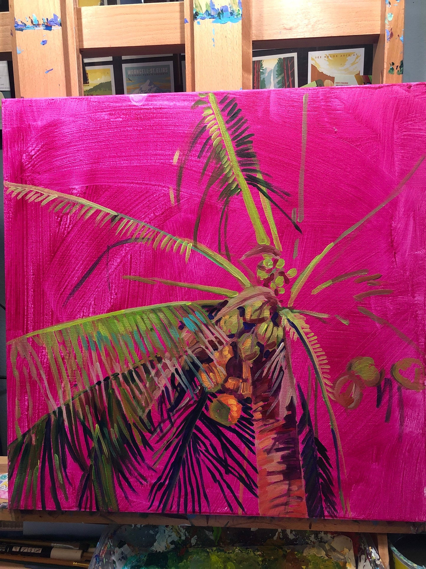 studio photo of work in progress, coconut palm tree painting with bright magenta wash