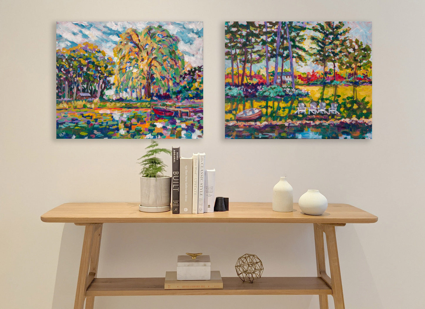 two vibrant lake shore paintings of michigan with shelf