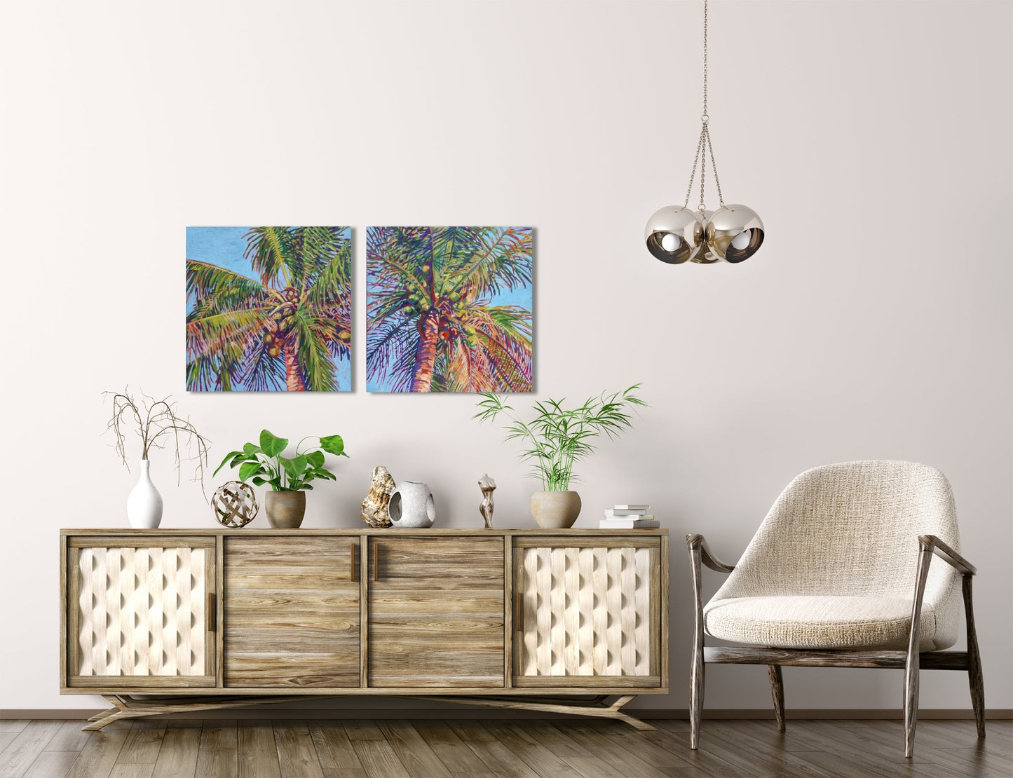 two coconut palm tree paintings in neutral living room area