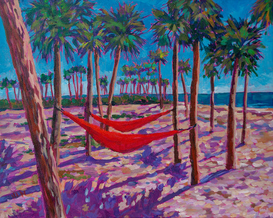 painting of two red hammocks hanging from palm trees on the beach