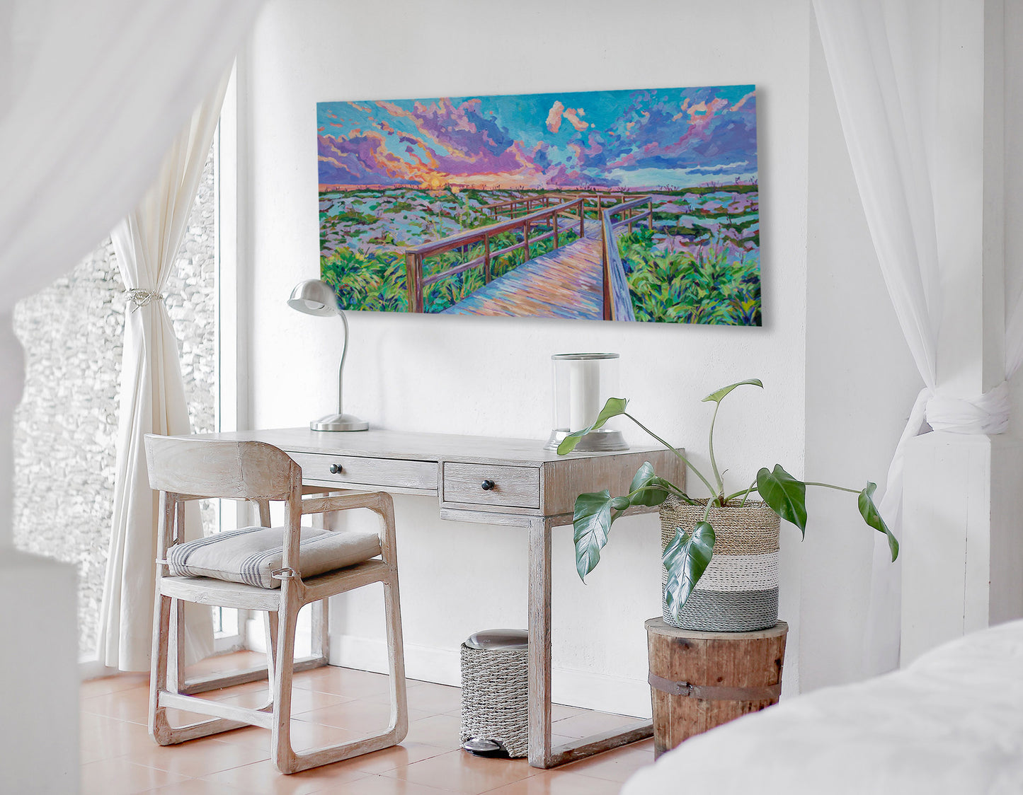 St Augustine Sunset painting in white neutral bedroom with desk