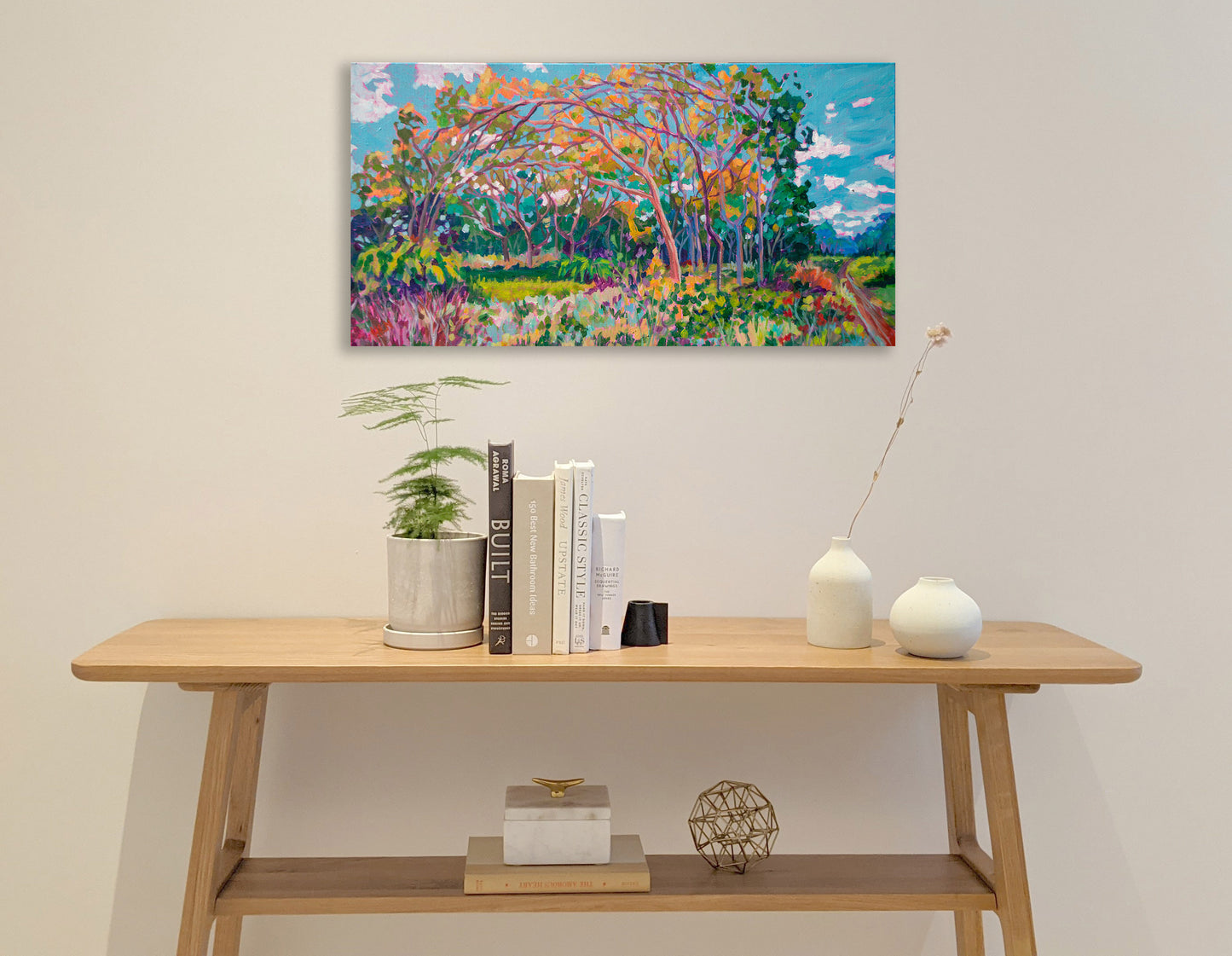 Painting on wall with shelf: Original vibrant impressionist landscape painting of tree branches meeting overhead